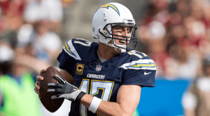 Los Angeles Chargers player throwing the football